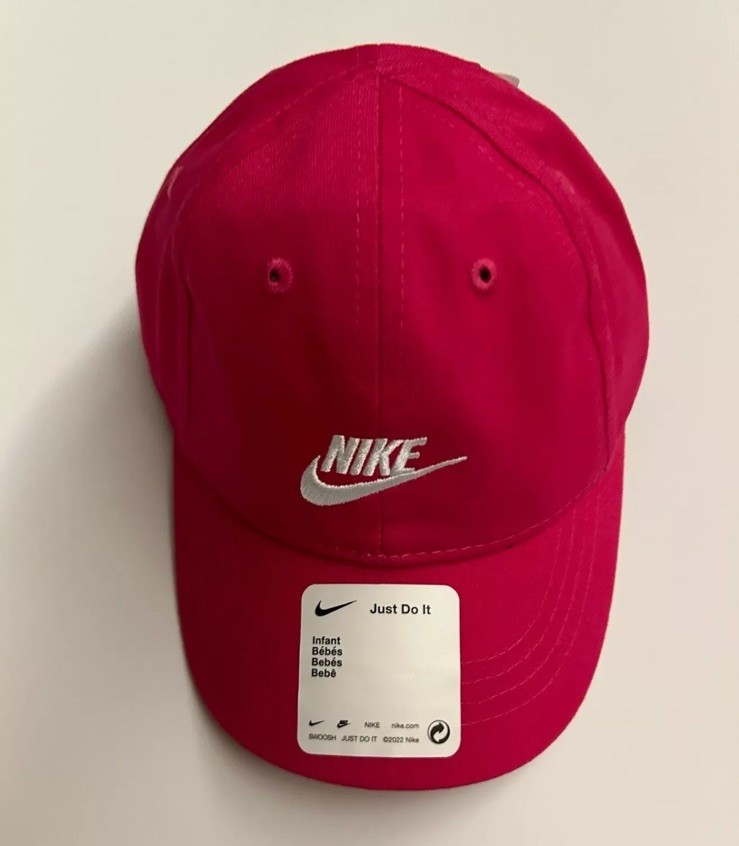 red nike hat with white swoosh