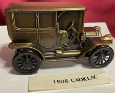 VINTAGE BANTHRICO METAL COIN BANK 1908 CADILLAC 5  LONG 1974