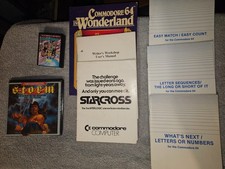 Lot of Commodore 64 manuals, books, cartridge, disk sleeves