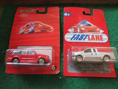 TOYS R US REAL TOY FAST LANE FORD EXPLORER SUV & F-350 PICK-UP 1/64 MOC