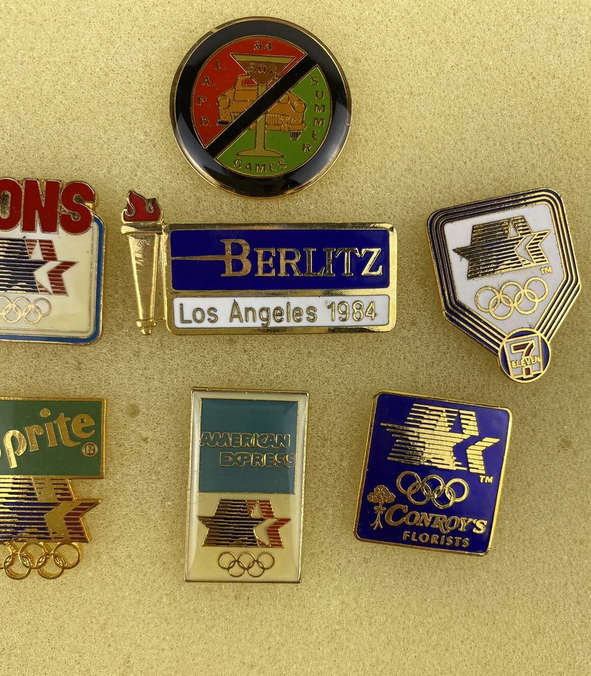 1984 Los Angeles Olympics pins Set of 7, LAPD, Sprite, 7-11, Amex, Vons, Conroys