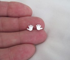 Sterling Silver 6.5mm hand post stud earrings.