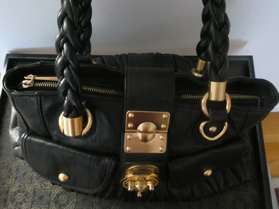 Bolso de hombro Steven by Steve Madden para mujer de cuero genuino negro dorado cierre giratorio Foto 4 de 4
