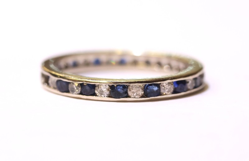 14K white gold .54ct diamond channel set sapphire eternity band ring 2.7g I1 I