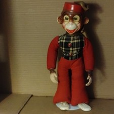 1930's Celluloid and corduroy Bellhop carnival prize monkey