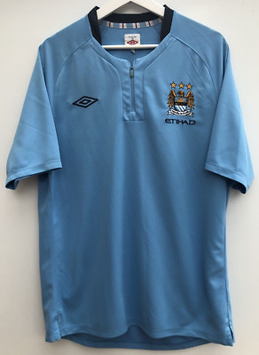 Vintage MANCHESTER CITY Football Shirt Umbro Blue 1/4 Zip Polo