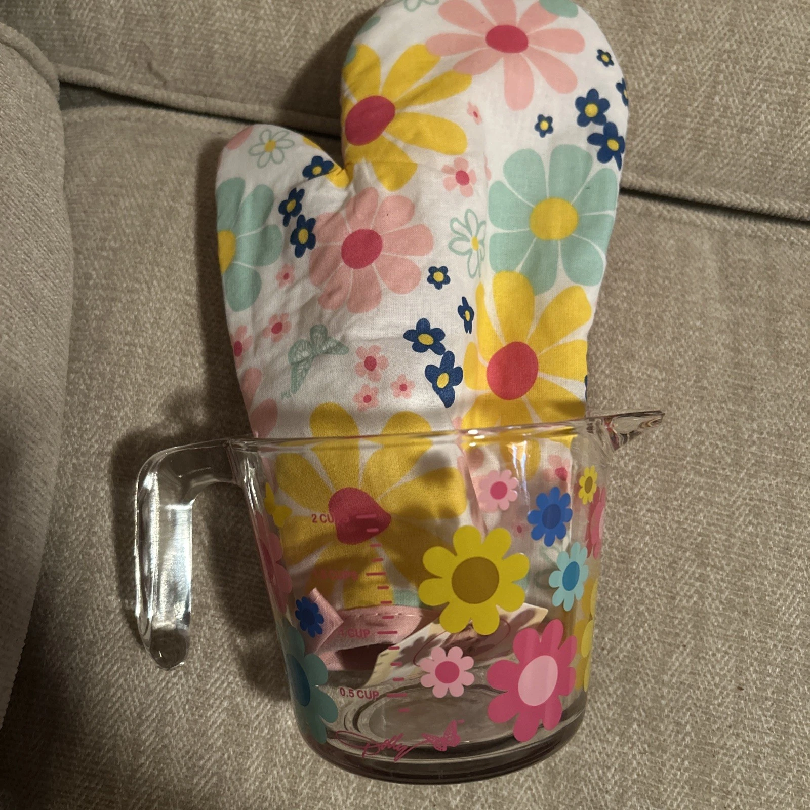 Dolly Parton measuring cup and hot pad