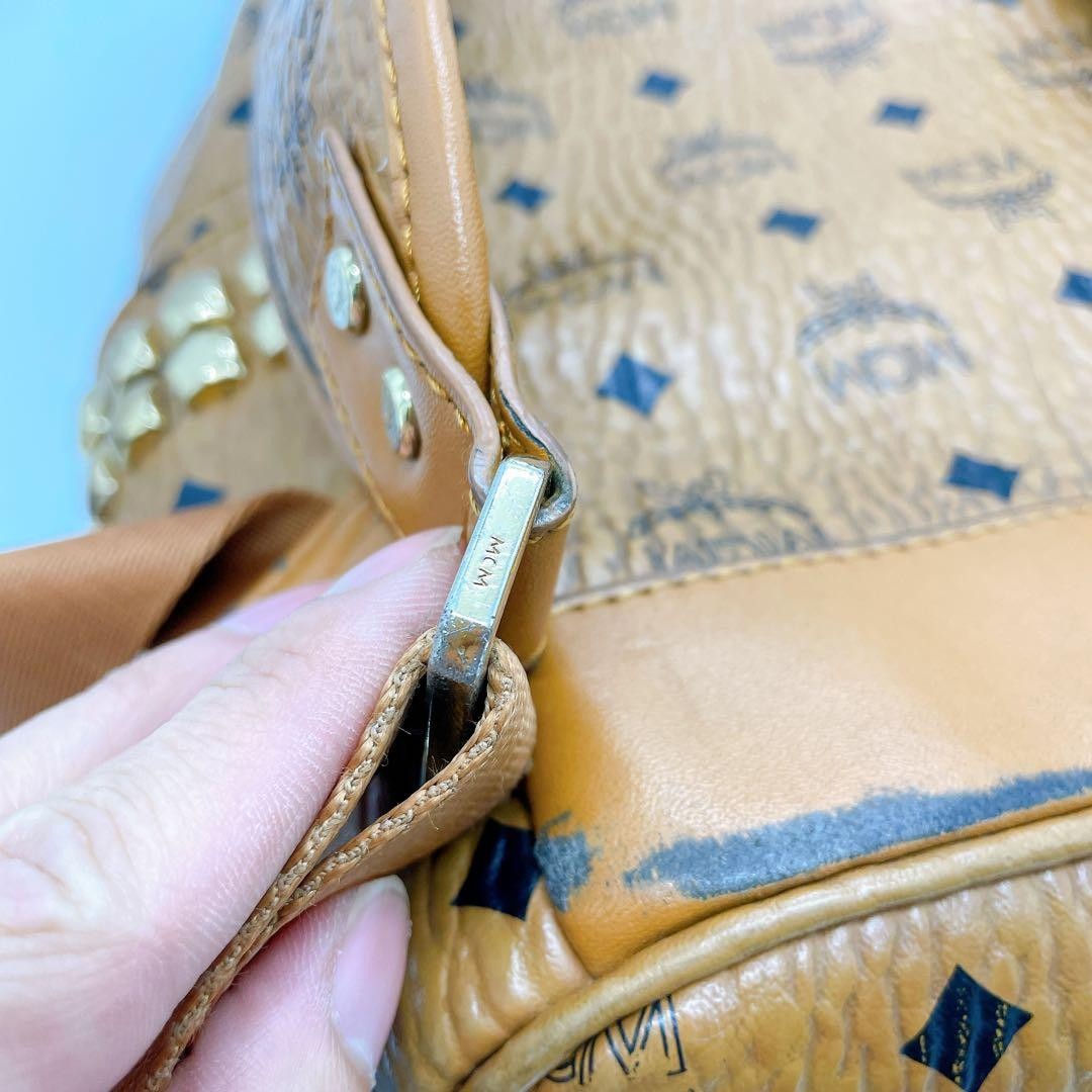 Mcm backpack camel logo all over pattern studs - image 12