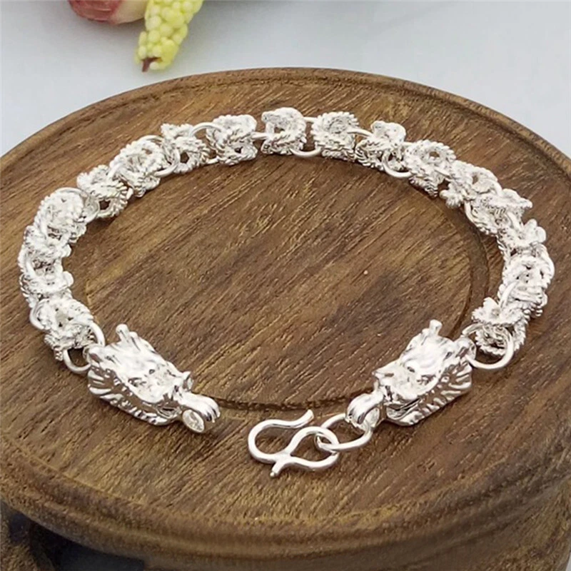 Breslate design for shop man in silver