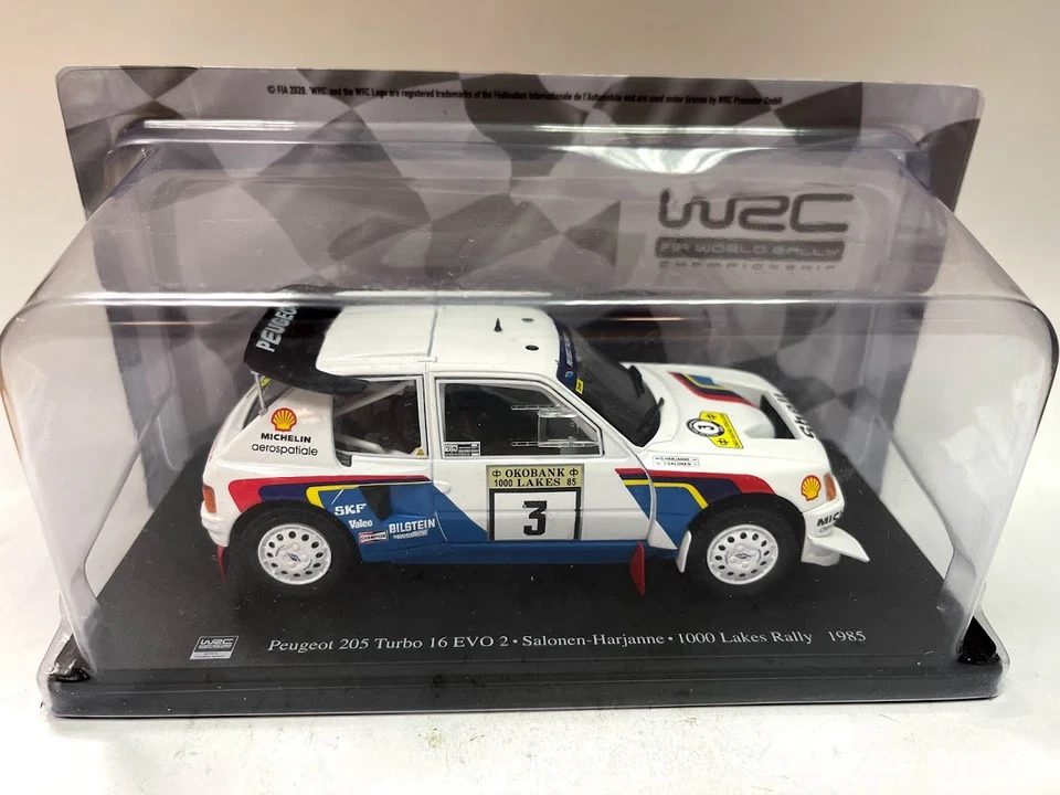 1:24 Peugeot 205 turbo 16 EVO 2 Salonen 1000 Lakes Rally 1985 Ixo Salvat Diecast - Immagine 2 di 2