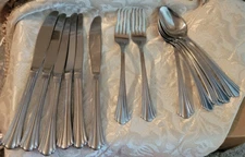 13 International Stainless Flatware Symmetry-Freemont Dinner Forks, Soup Spoons