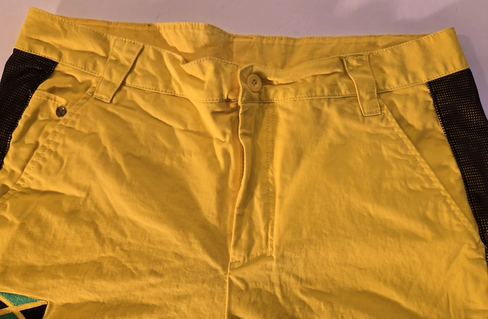 Pantalones deportivos olímpicos PUMA Jamaica talla L bolsillos de malla amarilla Foto 2 de 4