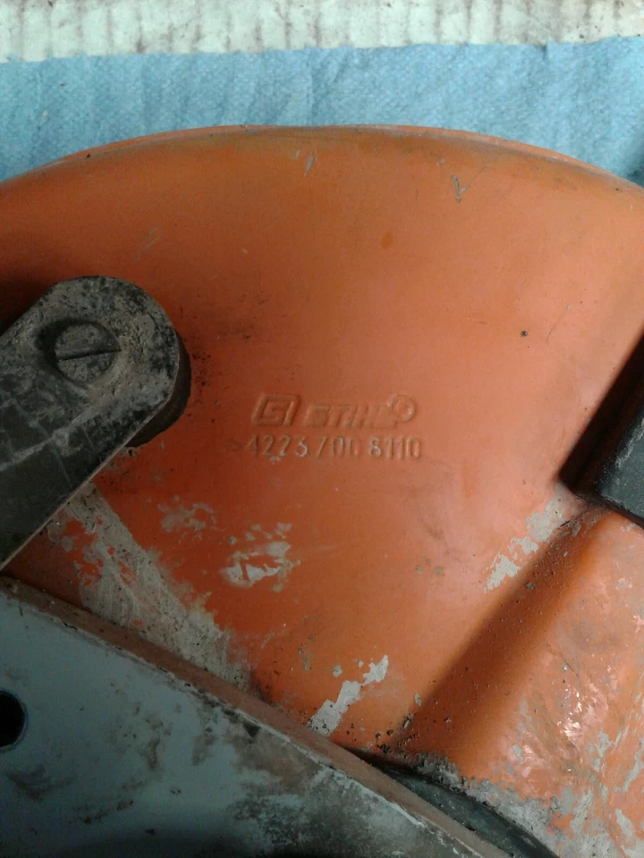 Protector de hoja de sierra de corte de hormigón Stihl TS350 con polea OEM 4223 700 8110 Foto 2 de 4