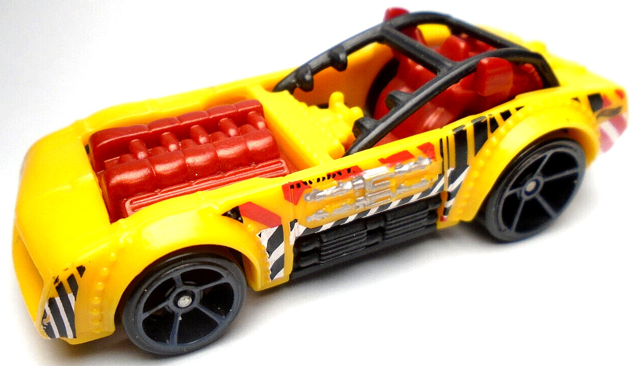 2017 HOT WHEELS PILEDRIVER YELLOW 1:64 DIECAST 3" RACE CAR W/ RED WHITE & BLACK