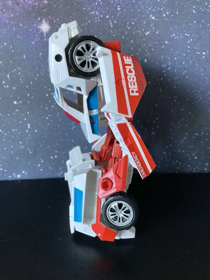 Hasbro Transformers Combiner Wars First Aid Deluxe Class Figure Defensor CW G1 - Image 3 of 4