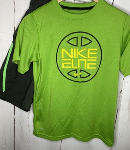 green and black nike outfit