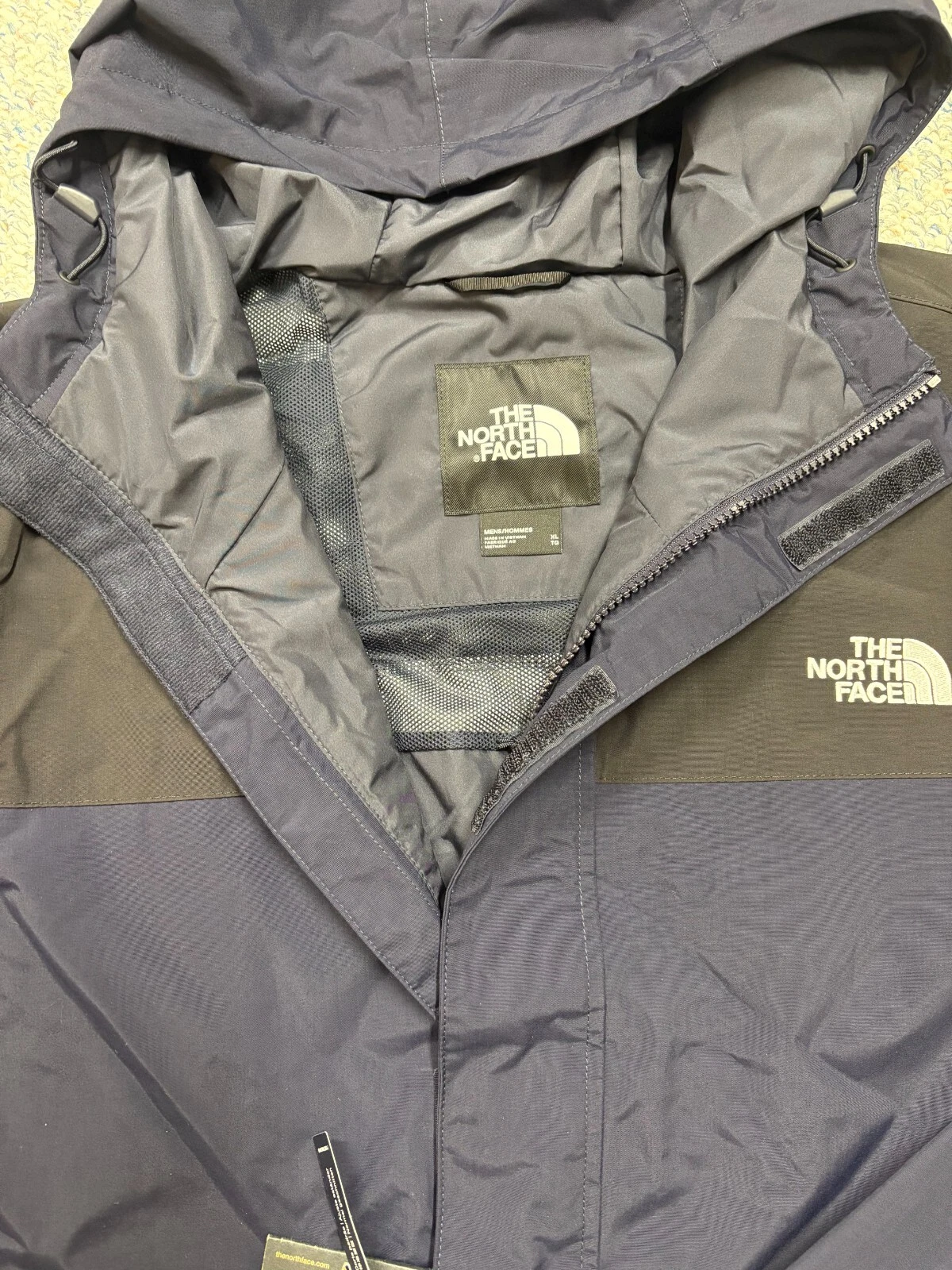 The North Face City Breeze Hooded Rain Parka in AVIATOR NAVY/ TNF BLACK