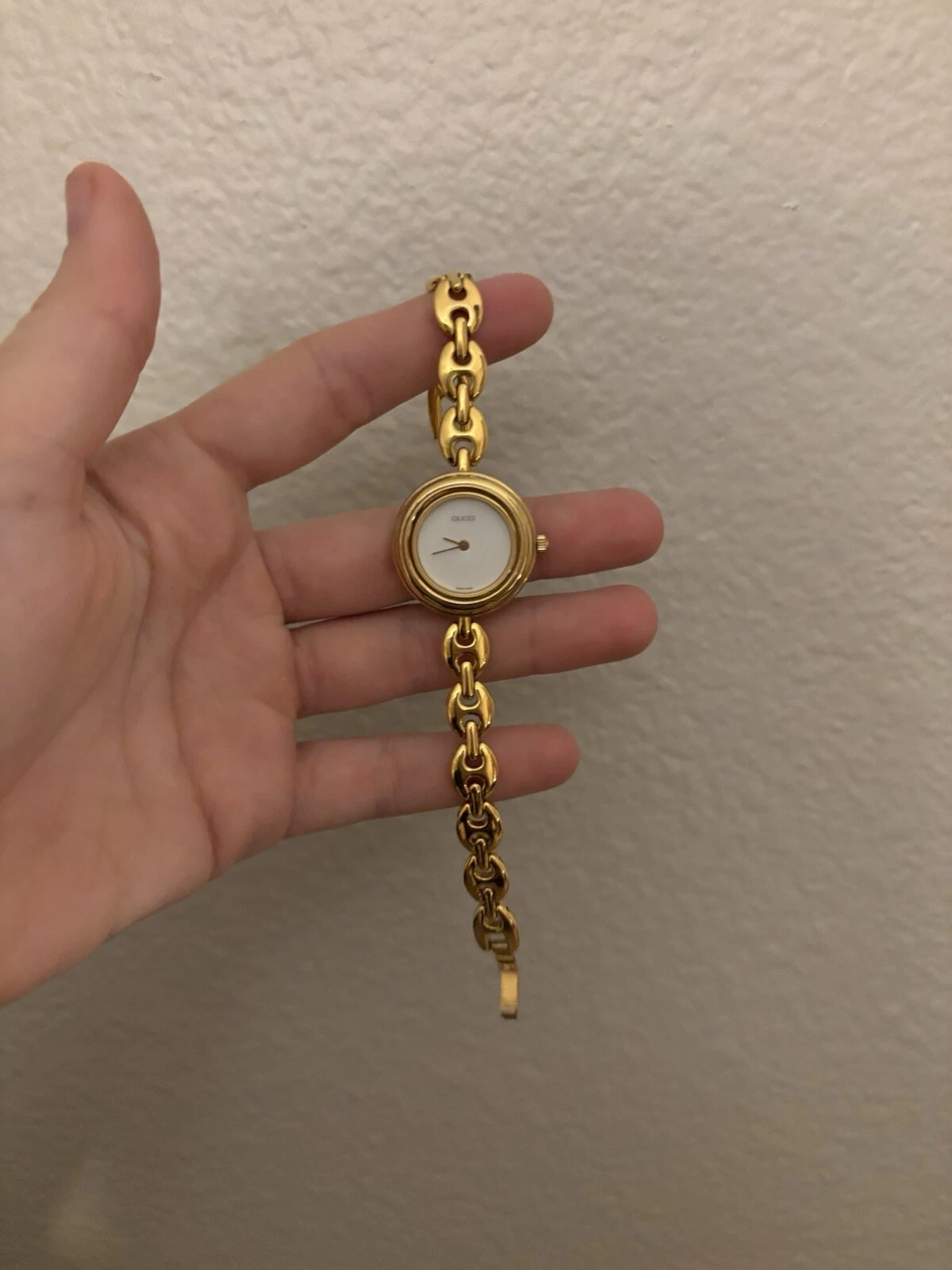 Montre vintage Gucci 11/12/2 lunette ton or à changer