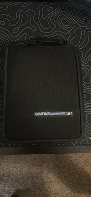 Cobalt Blue Gameboy Advance SP with Pokémon emerald, 20 Games, Charger, And Case