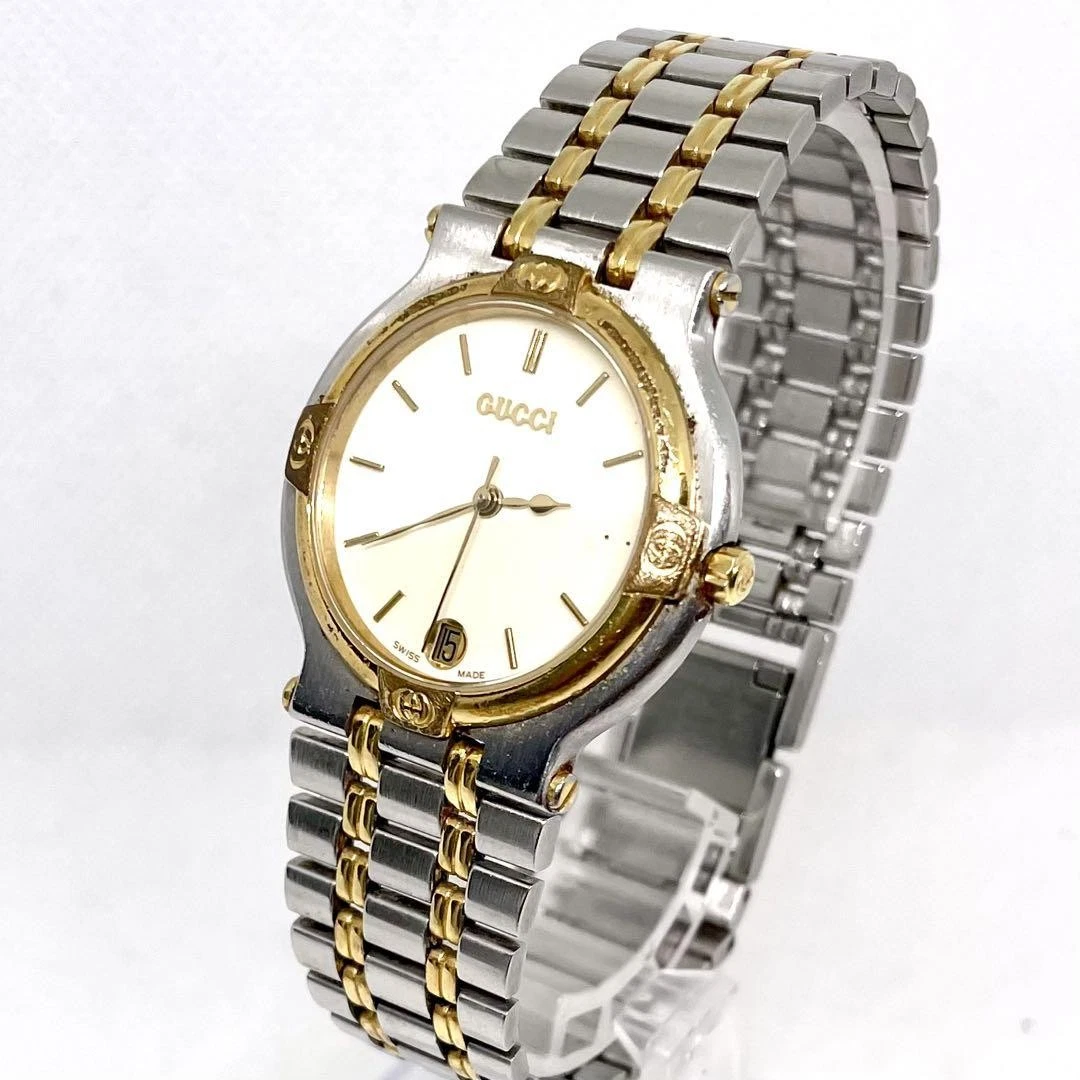 Produit fonctionnel montre Gucci 9000M quartz cadran ivoire date