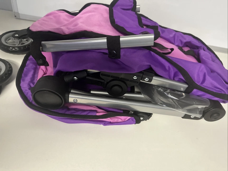 Cochecito de muñeca bebé con ruedas giratorias, juguete ajustable plegable de lujo nuevo Foto 2 de 4