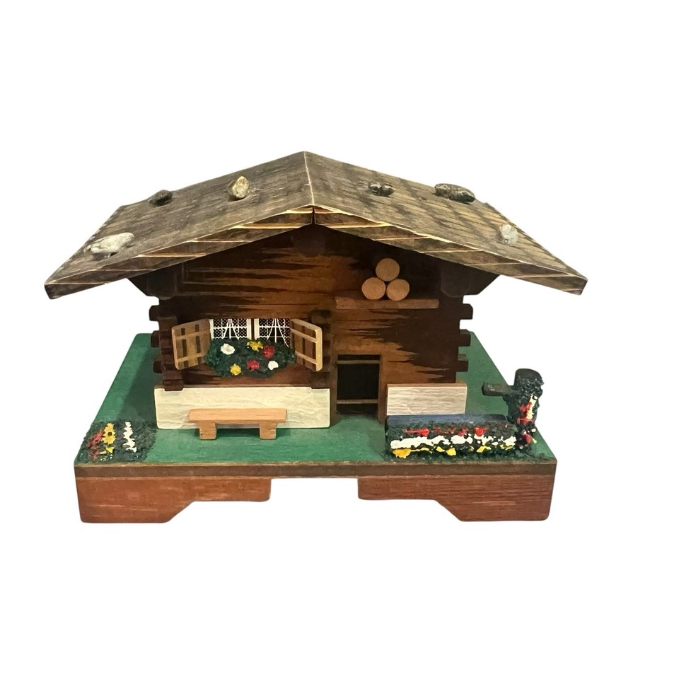 A Swiss Reuge chalet music box with hidden storage playing a Waltz — Reuge pedigree at an accessible under-$20 price is a genuine steal.