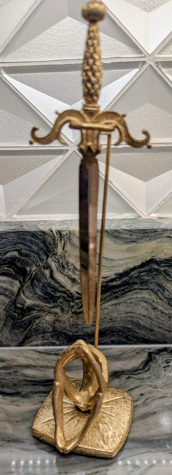 A 9-inch Italian brass letter opener with a modernist sculptural stand — this is desk *art*, the kind of object that stops visitors mid-sentence.