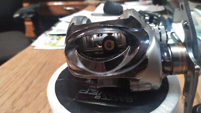 bass pro shops enigma baitcasting reel Fishing High Speed, Low Profile, with Carbon Fiber Drag | Adjustable Magnetic Brakes | Your Choice of Gear Ratio aluminum spool is V BASS PRO SHOPS Inshore Angler
