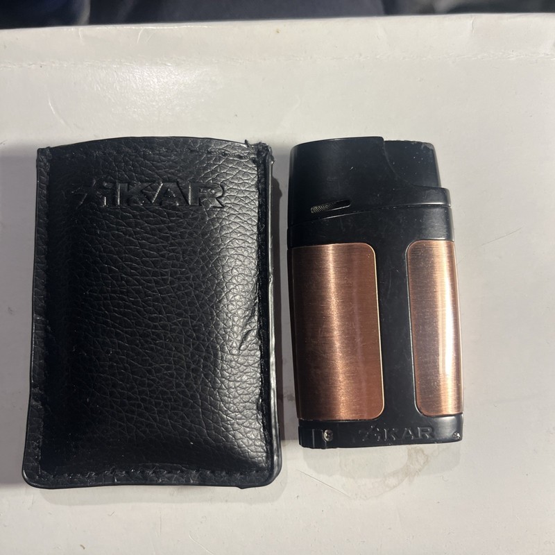 Xikar  dual Jet Cigar lighter with punch.