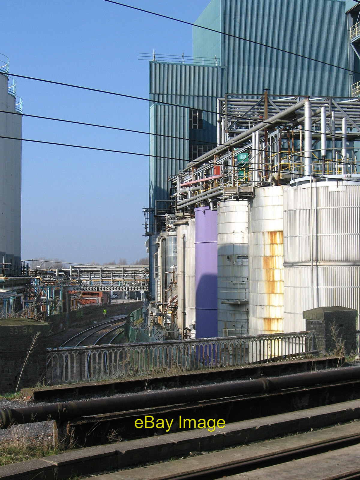 Photo 6x4 Warrington - Unilever works from Bank Quay Station  c2013