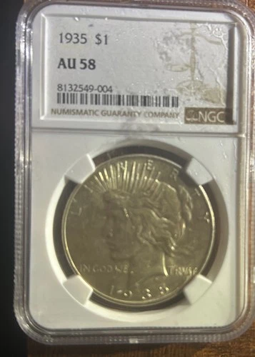 1935 $1 Peace NGC GRADED AU 58  nice coin id send in for reconsideration at PCGS