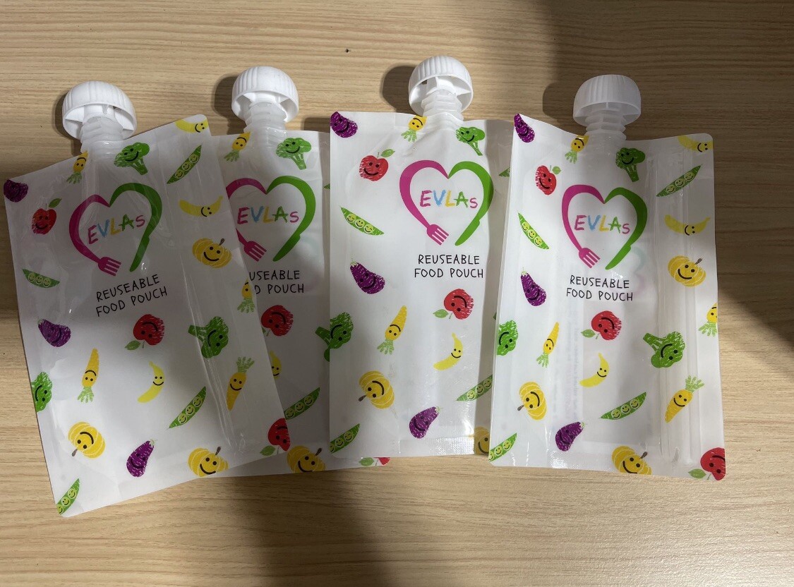 Evlas Baby Food  Maker NEW- Steams & Blends