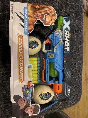   Zuru X Shot Dino Attack Dino Striker. Nerf like gun  