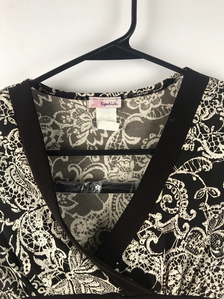 Camisa lápiz labial para mujer manga corta mediana cuello en V Foto 2 de 4