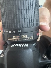 Nikon D D60 10.2MP Digital SLR Camera - Black Kit w/ DX Nikkor 55 x 200 mm lens