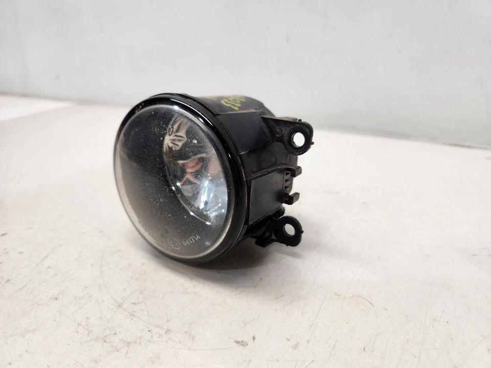 Luz antiniebla derecha Nissan Frontier 2005-09 pasajero - sin parachoques cromado Foto 3 de 4