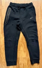 NIKE Tech Fleece Boys Large Black Sweatpants Joggers Swoosh Athletic Sportswear