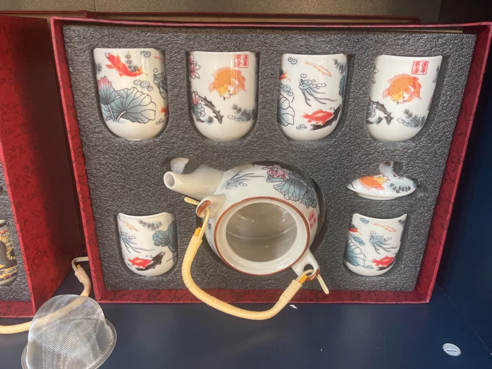 Este es un juego de utensilios de té con un estilo de diseño tradicional chino. Consiste en o Foto 4 de 4