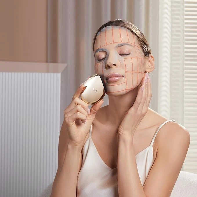 Dispositivo facial para el cuidado de la piel AMIRO S1, herramienta de refuerzo de elasticidad estilo sello dorado Foto 2 de 4