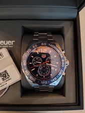 Tag Heuer mens watch, blue face, new open package with boxes and papers