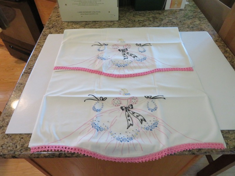 PAIR OF VTG. PILLOW CASES WITH EMBROIDERED LADY AND PINK EDGING-SO PRETTY.