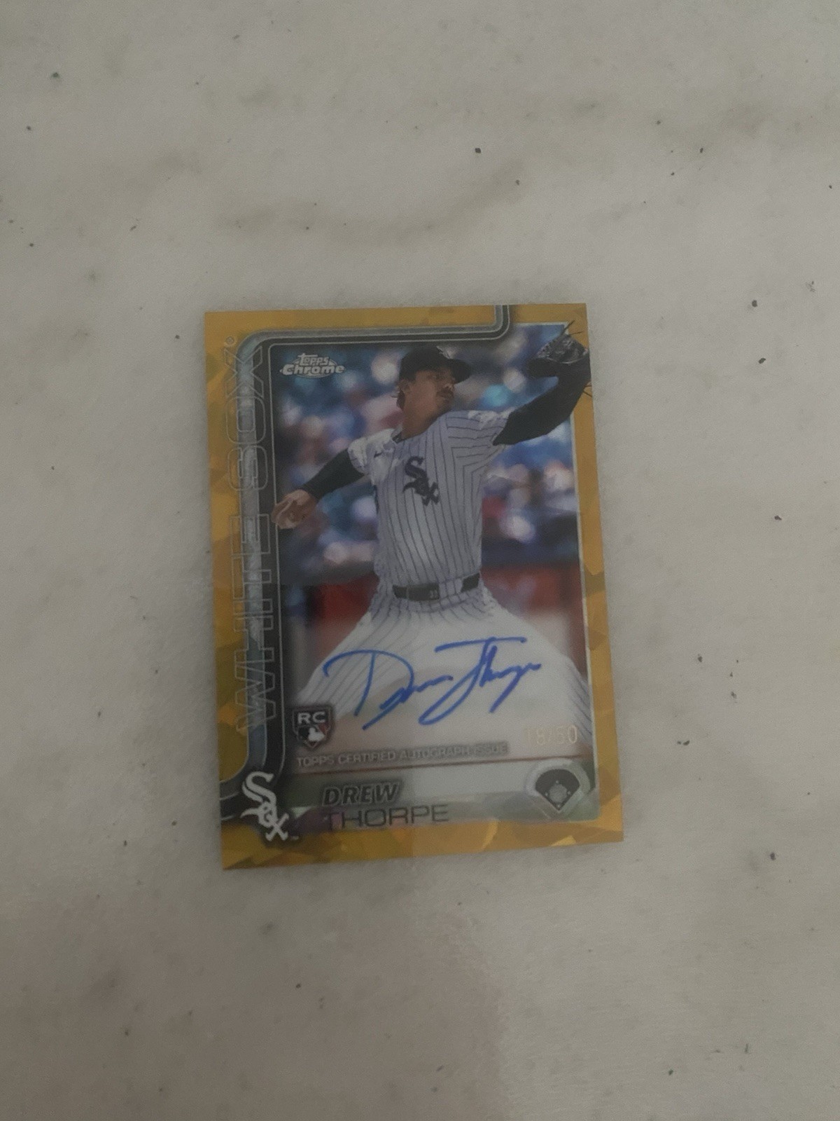 2025 Topps Chrome Sapphire - #RA-DT Drew Thorpe Gold Rookie Auto /50