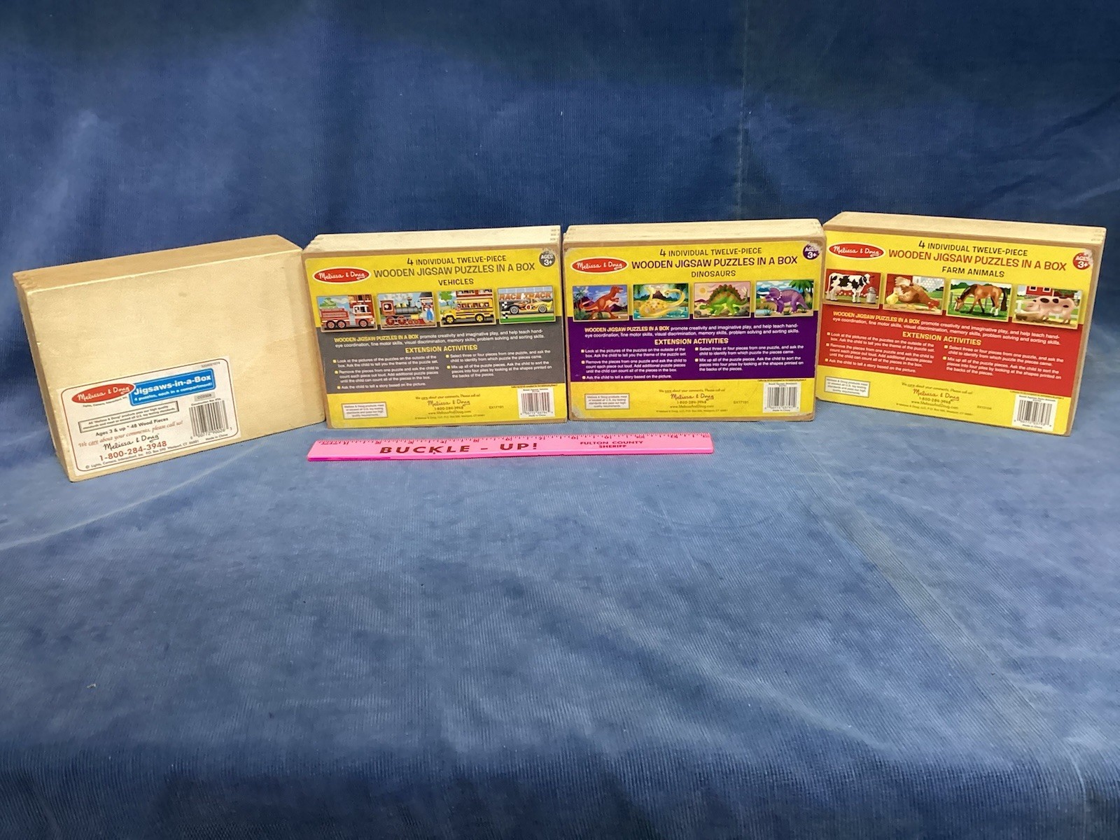 4 Wooden Puzzles in a Box by Melissa and Doug - 4 boxes = 16 puzzles.  Pre owned