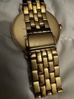 Woman’s Nixon The Arrow Point It Gold Series Stainless Steel Watch — photo 8