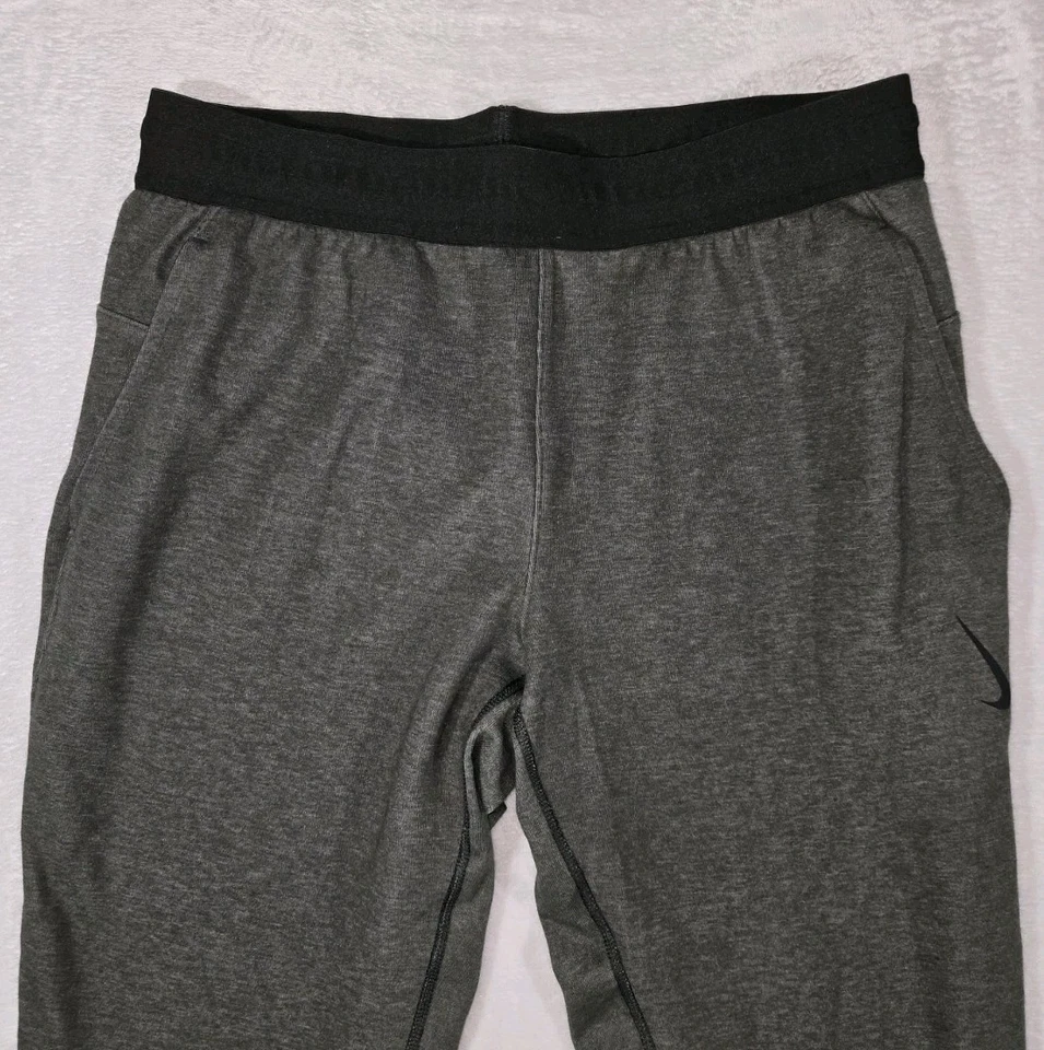 Calça de ioga Nike DriFit verde masculina média 32x27 - Imagem 4 de 4