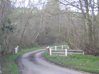 Photo 6x4 Bend on a narrow bridge Upper Treverward The narrow lane passes c2009