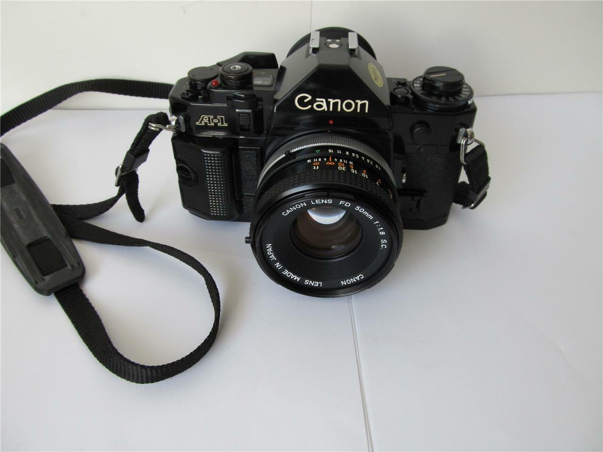Canon 50mm FD A-1 with Camera f⁄1.8 SLR 35mm Film Lens AE-1 + f1.8