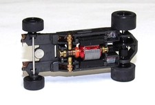 TOMY AFX AURORA MEGA-G CHASSIS STILL FACTORY SEALED,MINT,NEVER RAN,HO SL0T CAR.