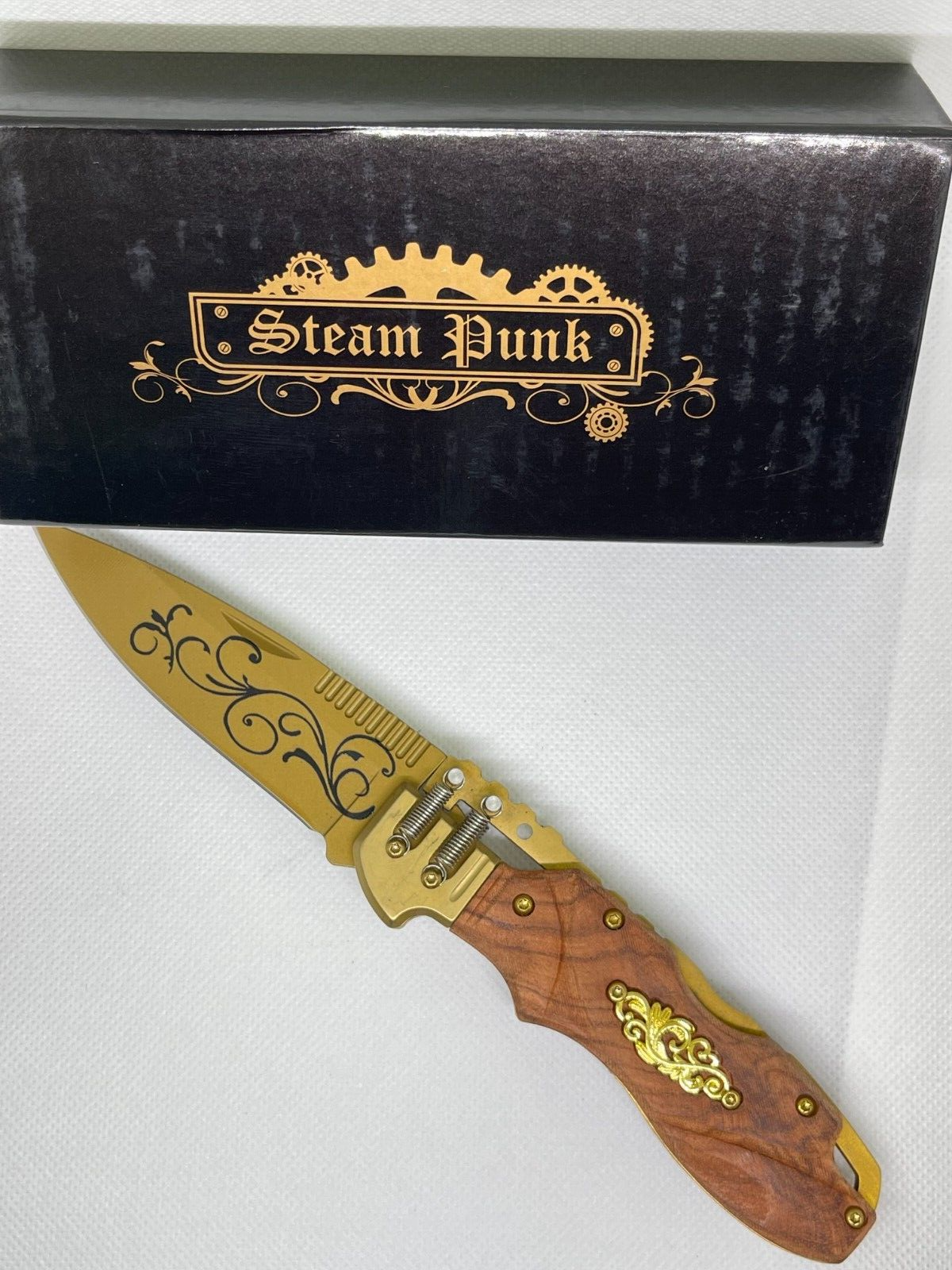 Steampunk-Inspired Compact Hunting Knife for Collectors and Outdoorsmen-image