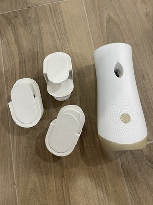Febreze Plug-In Air Freshener & Glade Automatic Spray Air Freshener Bundle